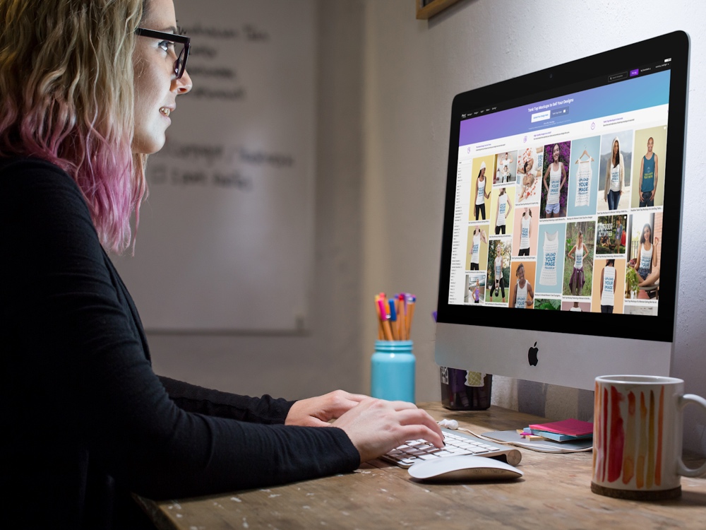 woman editing photos with canva