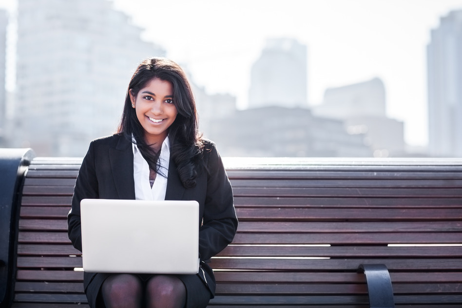 Indian businesswoman with laptop